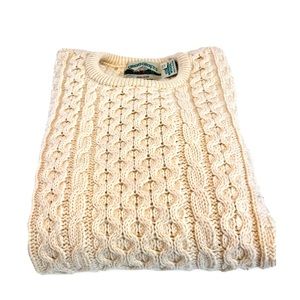 Kid’s Aran sweater. This sweater will lNo snags, some slight pilling on sleeves.